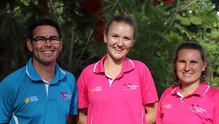 Andrew and Brianna wearing their Pink Ribbon Maids polo shirts